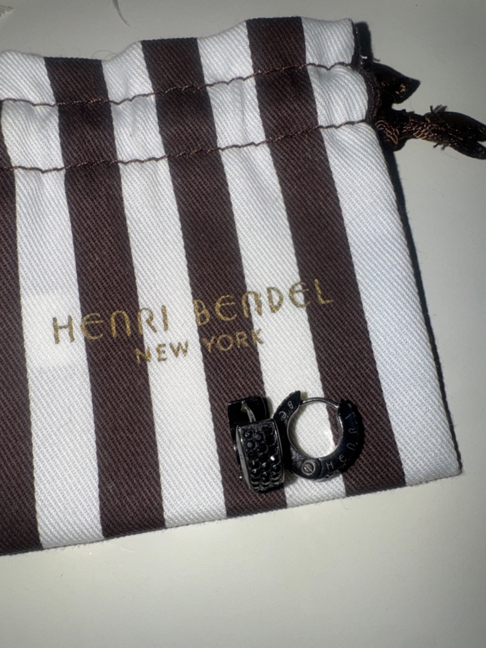 henri bendel black hoop huggie earrings with logo detailing